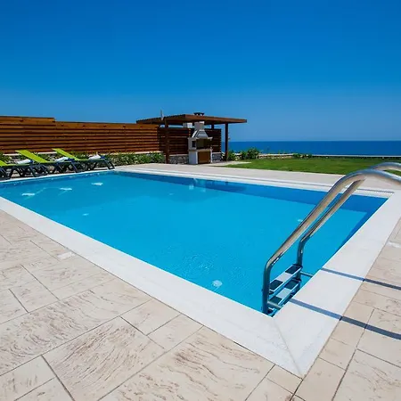 Villa Antonoglou - Waterfront Luxury Retreat