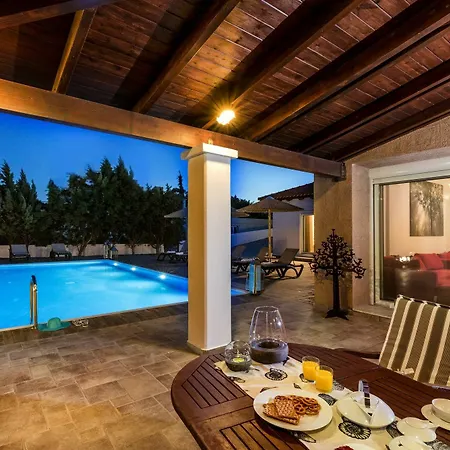 Villa Antonoglou - Waterfront Luxury Retreat